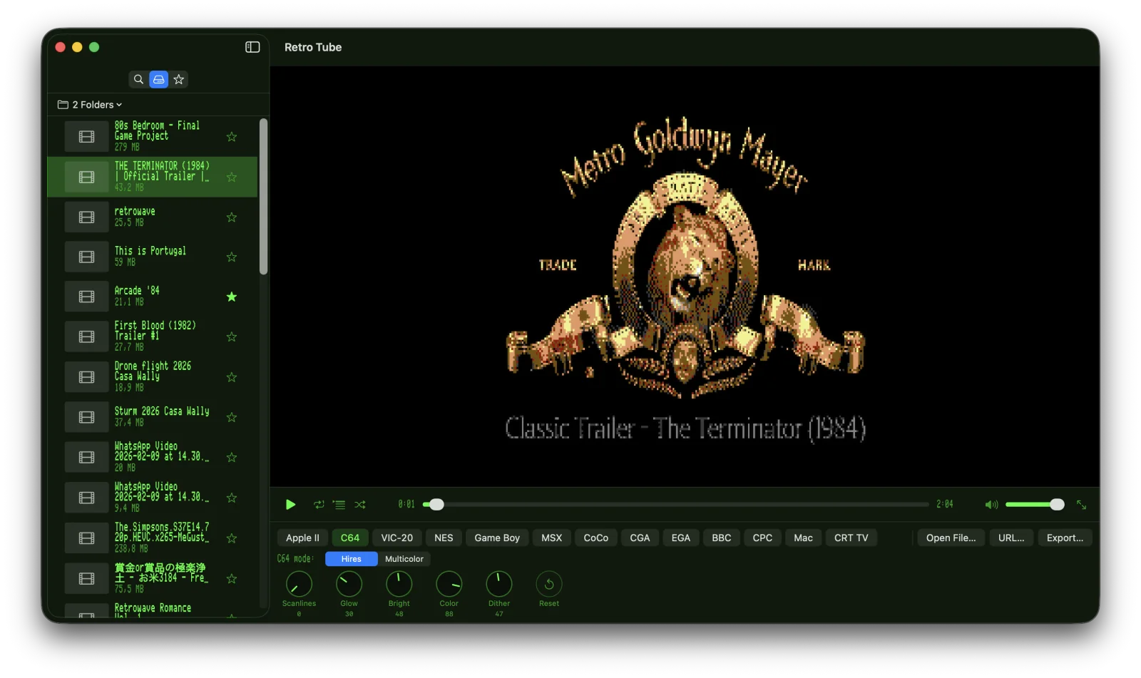 Retro Tube playing the MGM lion logo through Apple II HGR &mdash; chunky pixels in violet, green, orange, blue, black and white, with the Apple II green-phosphor UI skin