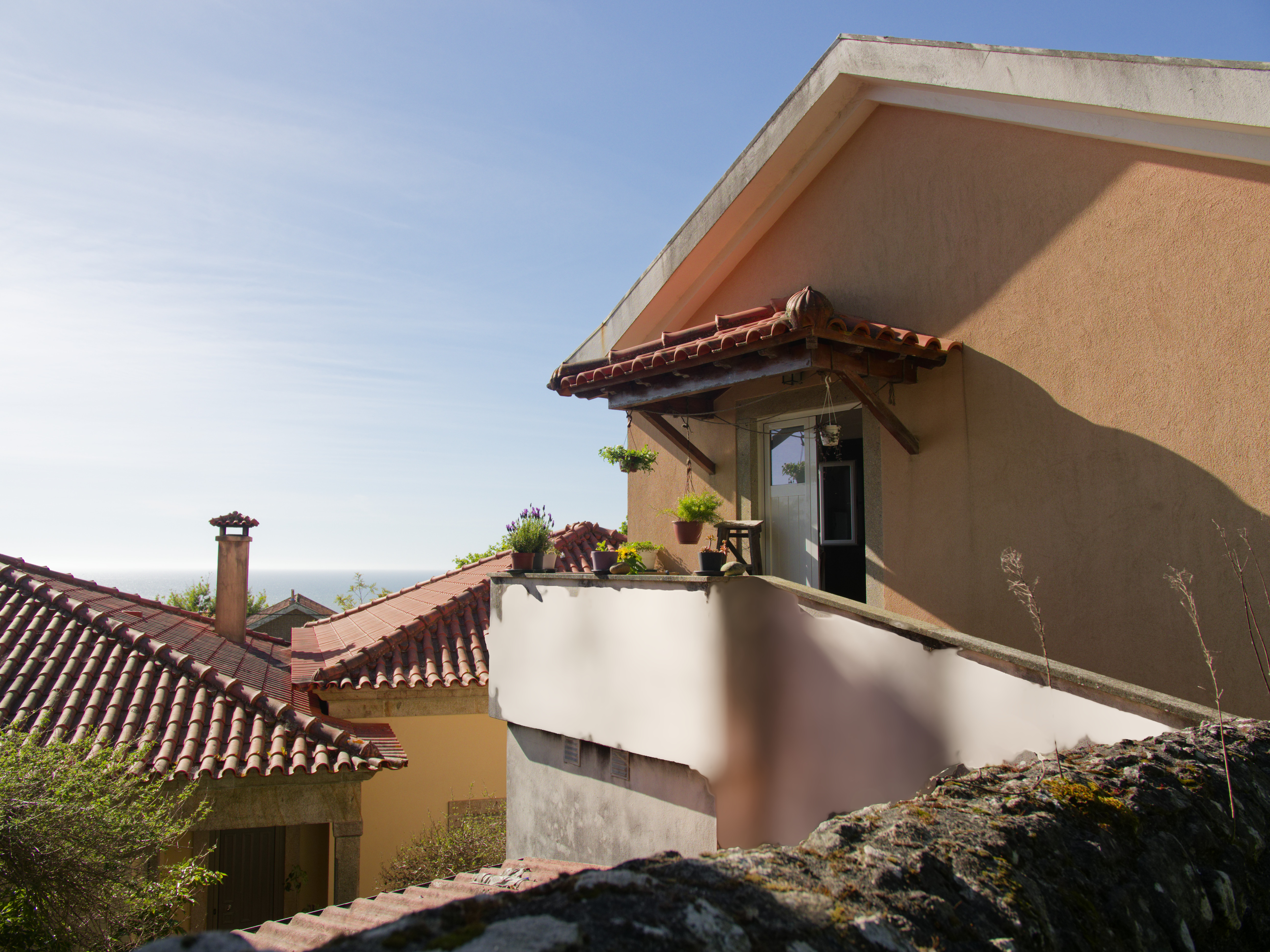 Entrada da casa com terraço